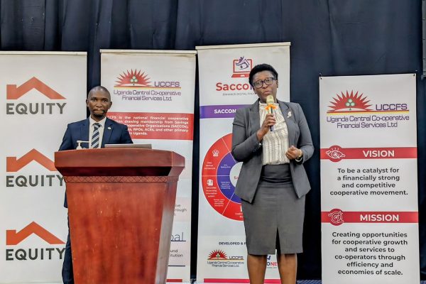 Olivia Mugaba, Equity Bank’s Head of SMEs and Segment Head of Micro Business, Bob Paul Lusembo addressing the AGM